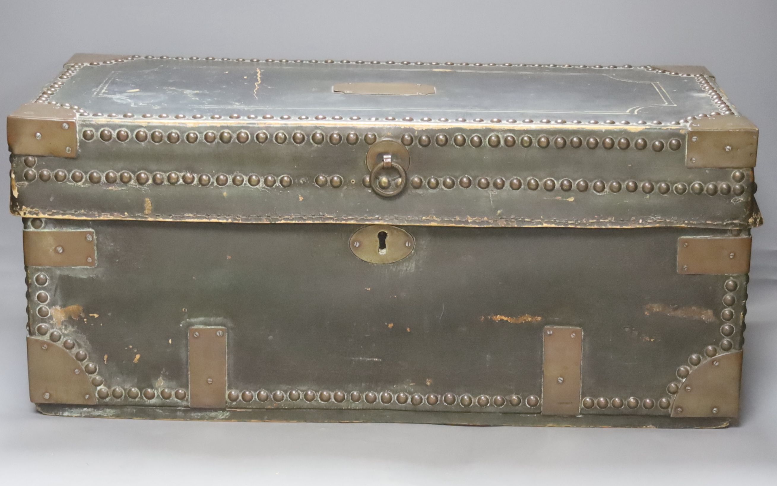 A 19th century Indo colonial leather and brass mounted travelling trunk, length 54cm, camphor wood lined